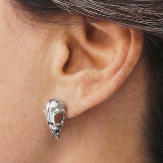 Sterling Silver Raven Skull Earrings on Ear