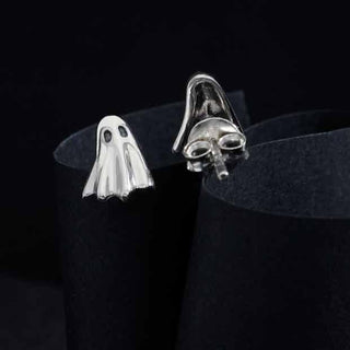 Nina Designs Sterling silver 3D Ghost Post Earrings on dark background