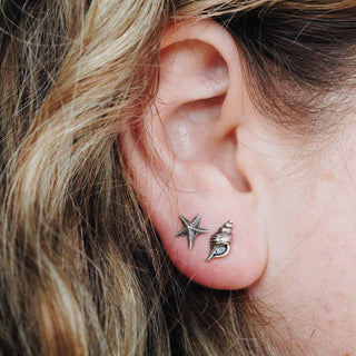 Sterling Silver Starfish and Conch Shell Earrings on Ear