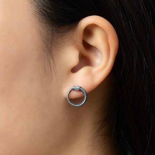 Sterling Silver Ouroboros Earrings on Ear