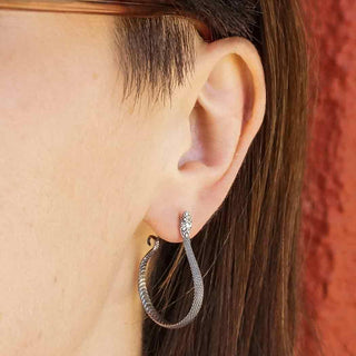Sterling Silver Snake with Scales Hoop Earrings on Ear