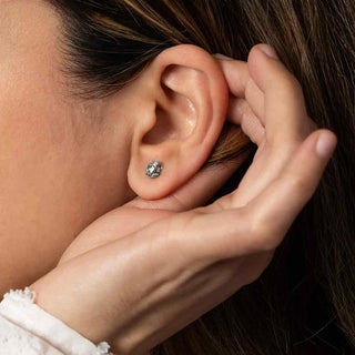 Sterling Silver Tiny Dimensional Frog Post Earrings 7x7mm on model ear