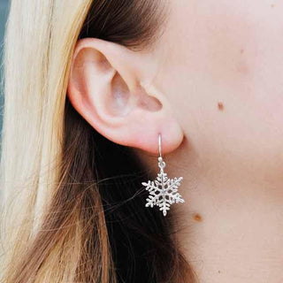 Sterling Silver Snowflake Earrings on Ear