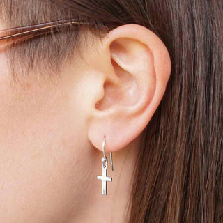 Sterling Silver Cross Dangle Earrings on Ear