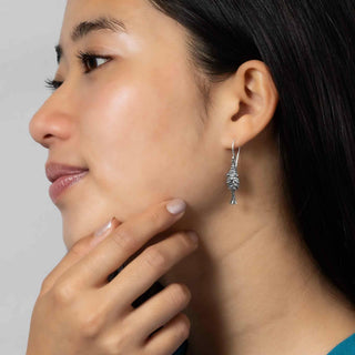 Sterling Silver Dimensional Pine Tree Dangle Earrings on model