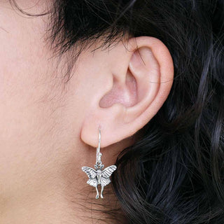 Sterling Silver Luna Moth Dangle Earrings on ear