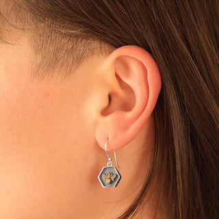 Silver Hexagon Shadowbox with Bronze Bee Dangle Earrings on Ear