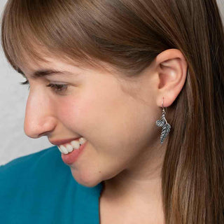 Sterling Silver Fern Dangle Earrings on model