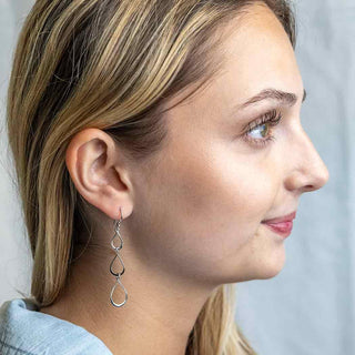 Sterling Silver Three Falling Raindrop Earrings on Woman