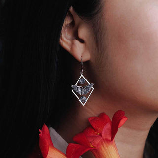 Sterling Silver Geometric Moth Dangle Earrings on model