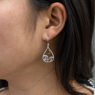 Silver and Bronze Mushroom and Crescent Moon Teardrop Earrings on Ear