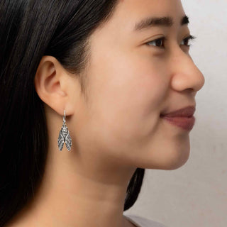 Sterling Silver Cicada Dangle Earrings on model