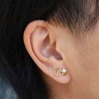 Bronze Star and Moon Post Earring on Ear