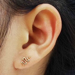 Bronze Snake Earrings on Ear