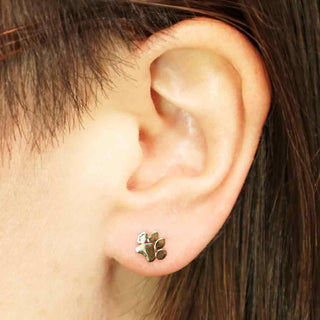 Bronze Paw Print Earrings on Ear