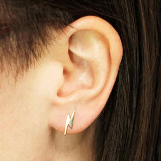 Bronze Lightning Bolt Earrings on Ear