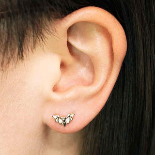 Bronze Mini Bat Post Earrings on Ear