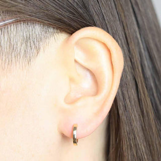 Bronze 11mm Huggie Hoop on Ear