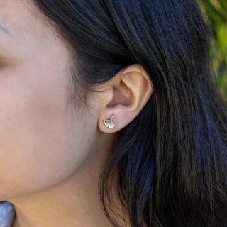 Bronze Ginkgo Post Earrings on ear
