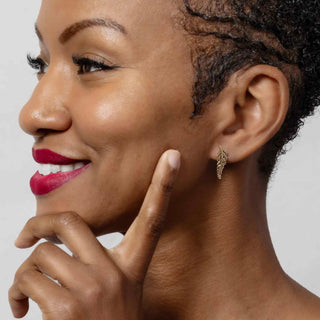 Bronze Fern Post Earrings on model