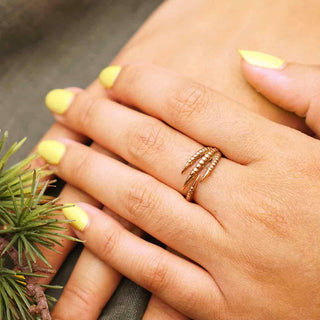 Bronze Adjustable Bird Claw Ring on model