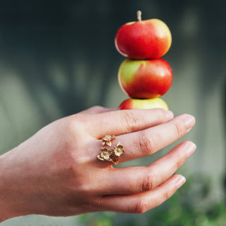 Bronze Dogwood Flower Ring on hand