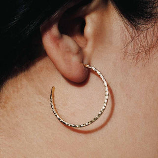 Bronze Hammered Hoop Earrings on Ear