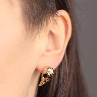 Bronze Raven Skull Earrings on Ear