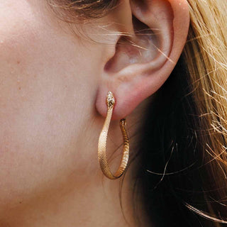 Bronze Textured Snake Hoops on Woman