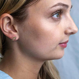 Bronze Swallow Earrings on Ear