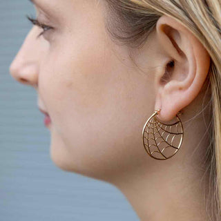 Bronze Spiderweb Hoops on Ear