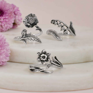 Three Sterling Silver Flower Rings