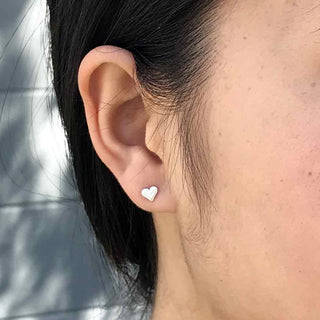 Sterling Silver Love Heart Post Earrings on Ear