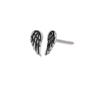 Pair of silver angel wing earrings on a white background