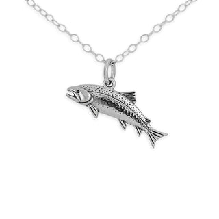 Silver fish necklace on white background
