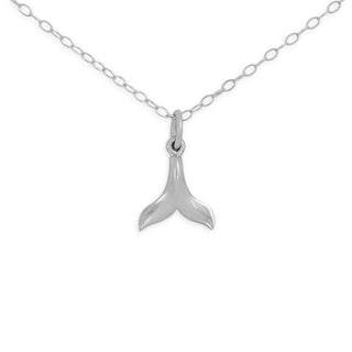 Silver whale tail pendant on a chain against a white background