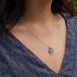 Sterling Silver UFO in Clouds Necklace on Neck