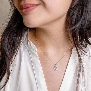 Small Silver and Bronze Heart Shadowbox Necklace on Woman