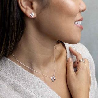 Sterling Silver Ribbon Bow Necklace on Neck