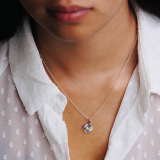 Bronze Heart with Silver Ridged Sunrays Necklace on Neck