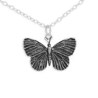 A silver butterfly pendant necklace with detailed wing textures, shown on a clean white background.