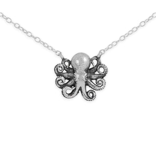 Silver octopus pendant on a chain against a white background