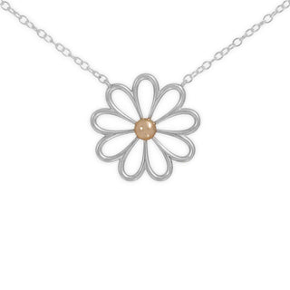 Floral necklace with silver frame and gold center on a white background