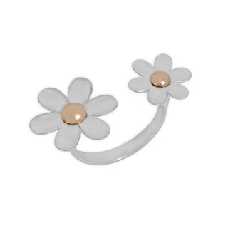 Silver flower-shaped earrings with bronze centers on a white background