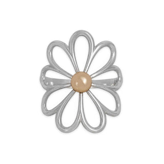 Silver flower-shaped ring on a white background