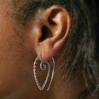 Pointed Spiral Teardrop Earrings with Silver Granulations on Ear 