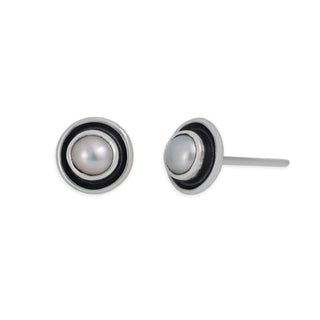 Pair of silver earrings with a central pearl on a white background