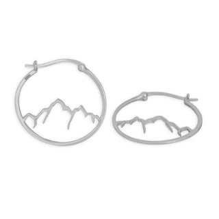 Silver hoop earrings with mountain design on a white background