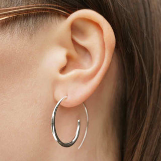 Sterling Silver Tapered Hoop Earrings on Ear