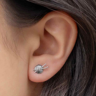 Nina Designs Sterling Silver Yarn Ball with Knitting Needles Earrings on Ear 